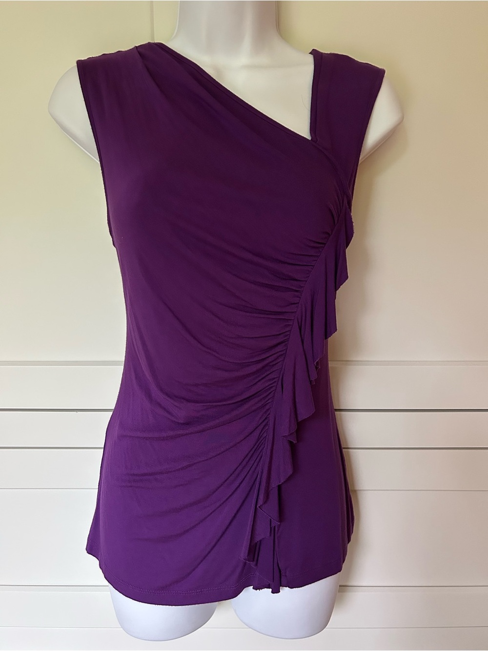 Kenar Sleeveless Ruffle Front Top